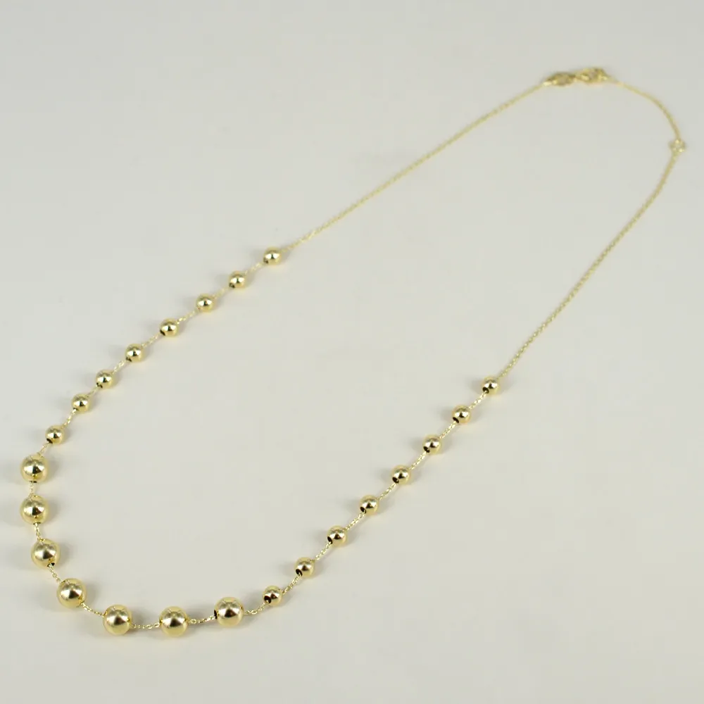 Collana girocollo in oro giallo con sfere oro a scalare