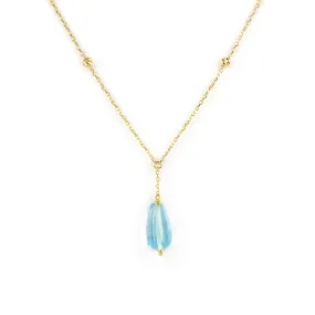 Collana in oro giallo con pendente di topazio azzurro