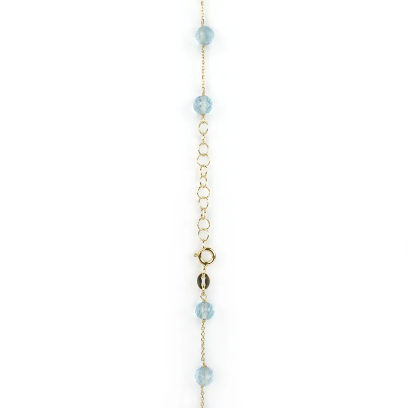 Collana in oro giallo con topazio azzurro tondo e sfaccettato