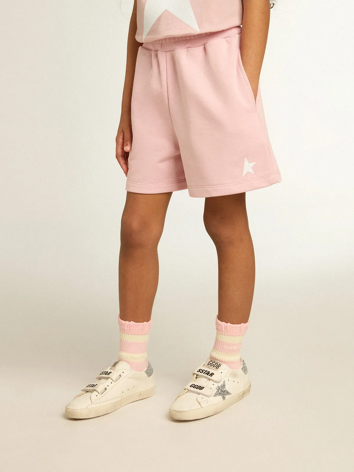 Pantaloncino da bambina color rosa con stella bianca