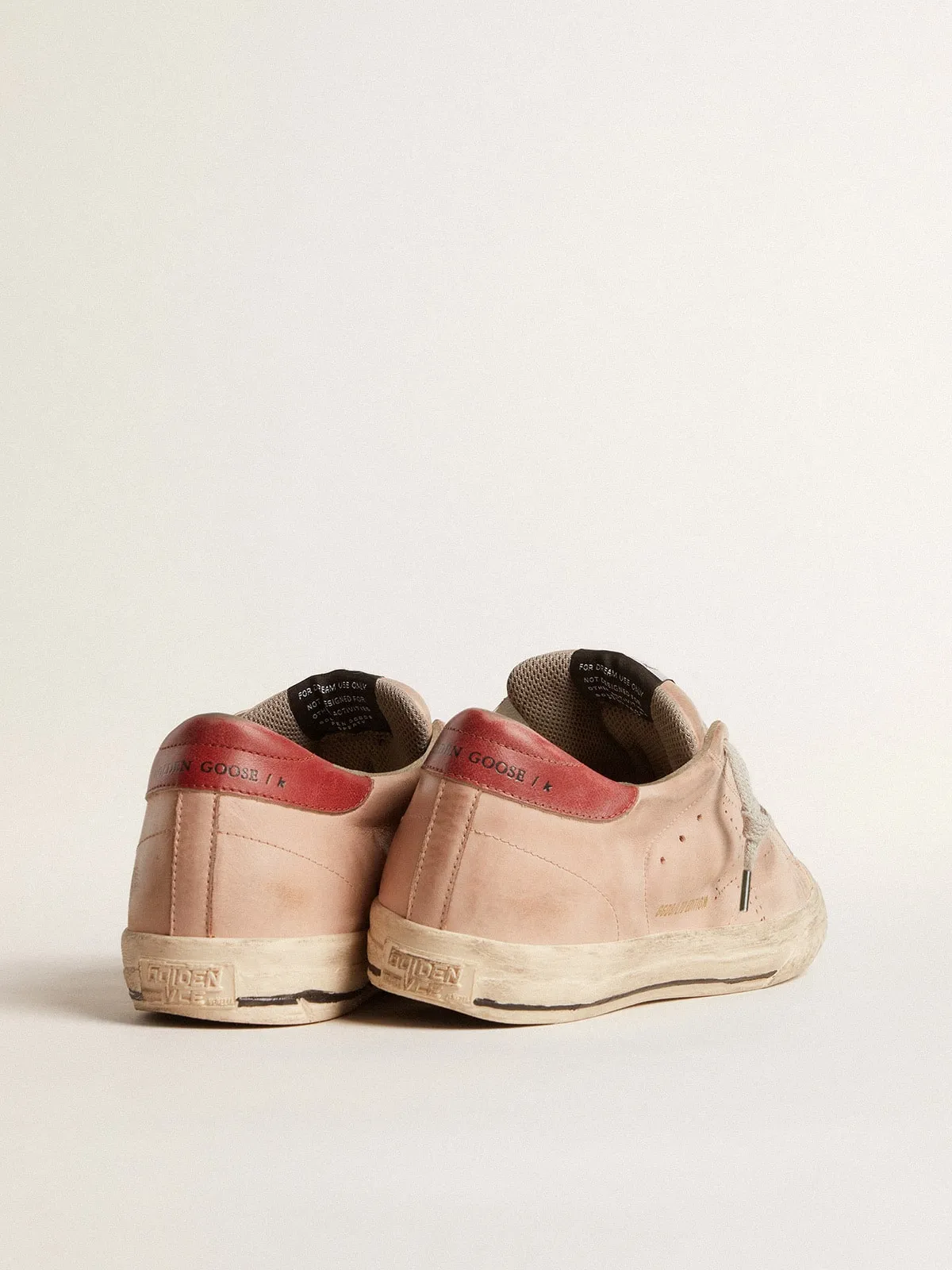 Super-Star LTD in nabuk rosa con stella traforata e talloncino in pelle